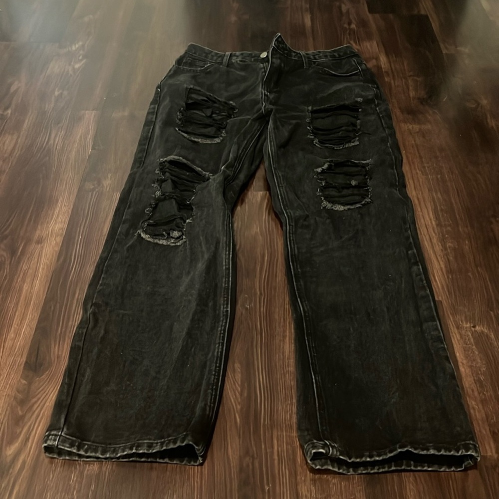 ripped/distressed style wide leg black jeans